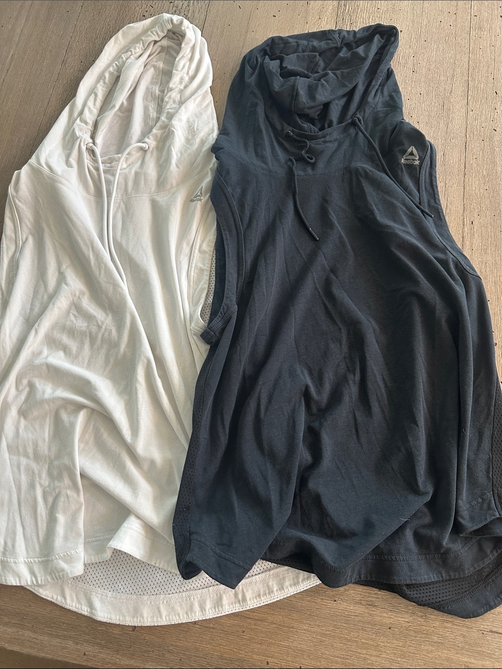 Reebok White and Black Sleeveless Hooded Tank Tops